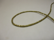 Ethiopia spacer beads brass 1x1mm +/-.66cm