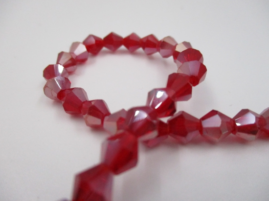 Crystal BIC 6mm Dk Red Ab +/-40pcs